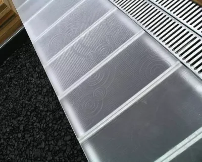 Flooring in decorative glass