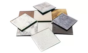 Antique and aged mirror samples in bronze, grey and gold tones with distressed silvering