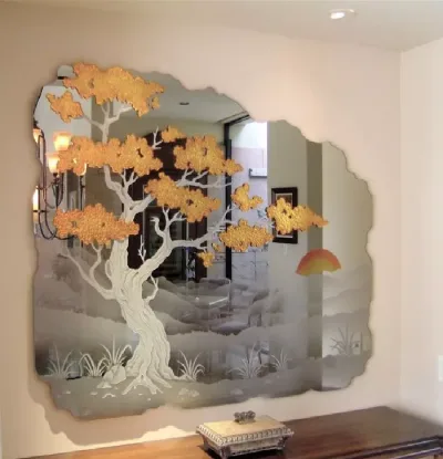 Decorative glass mirror panel with an etched and gilded tree design